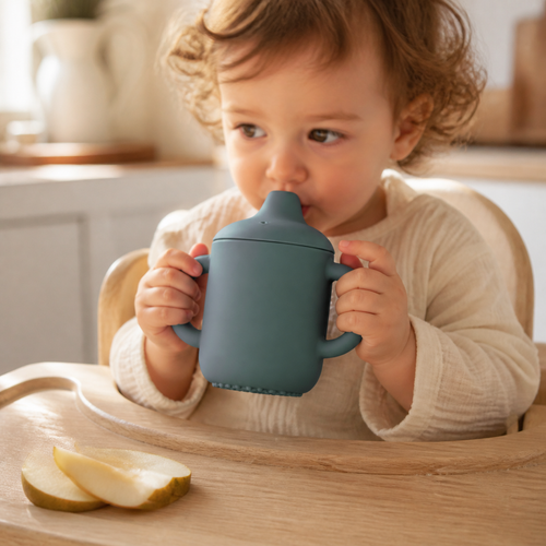 Child using the YumBella Silicone Training Cup – 180ml
